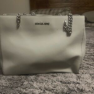 Michael Kors pirse barely used like once or twice.